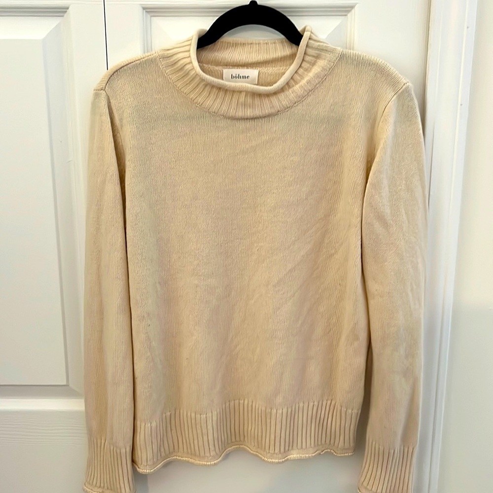 Cream turtle neck sweater in size medium